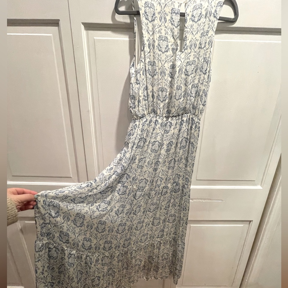 Sheer silk outer shell maxi dress.  Blue design on white with yellow accents.